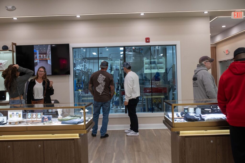 Sales floor and display cases inside Red Oak Dispensary in Absecon, NJ