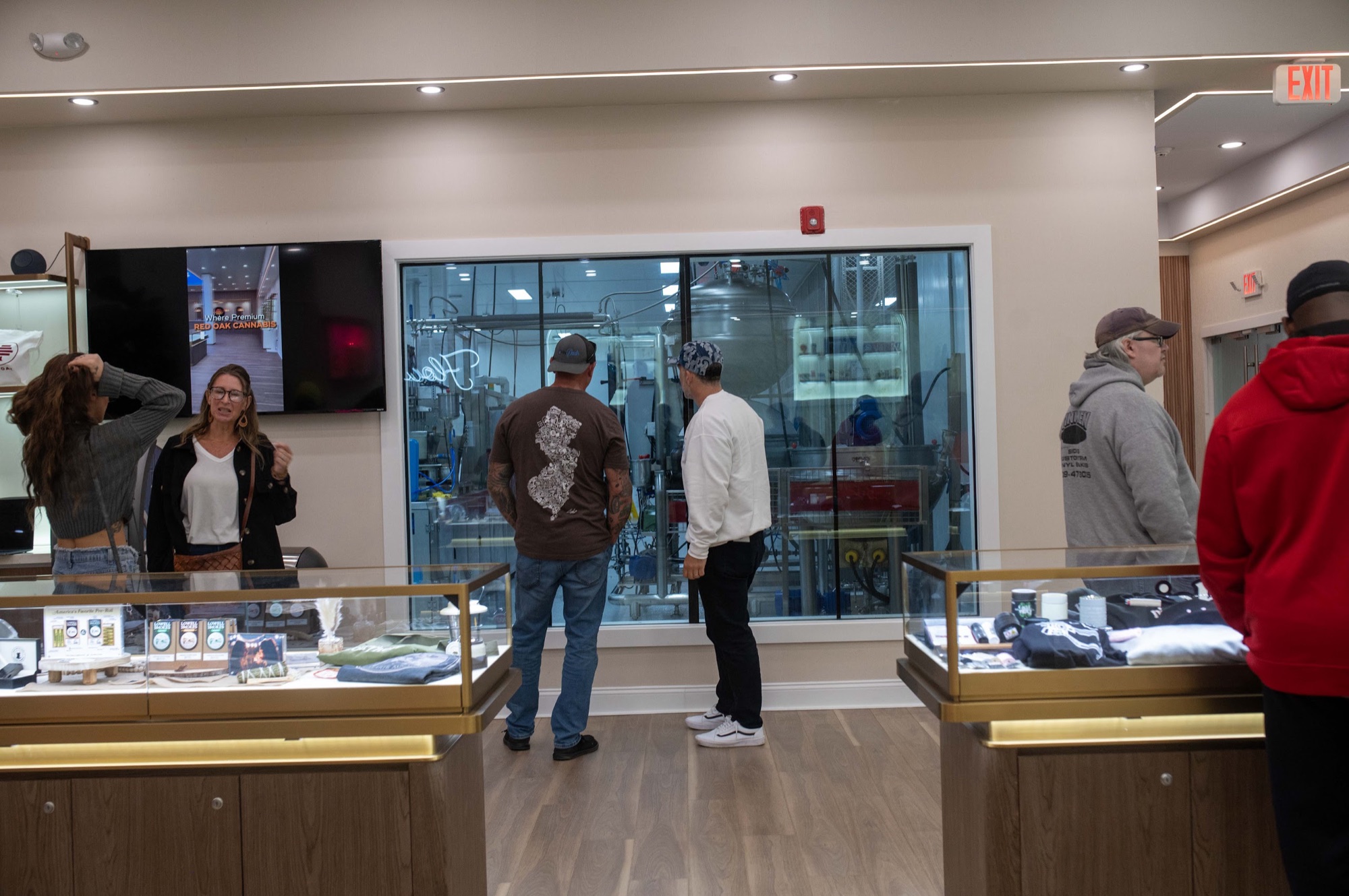 Sales floor and display cases inside Red Oak Dispensary in Absecon, NJ